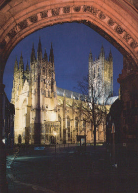 Cathedral at night viewed through an archway
