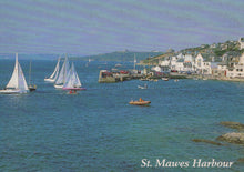 Load image into Gallery viewer, Sailing boats in St. Mawes Harbour with buildings on a hillside.
