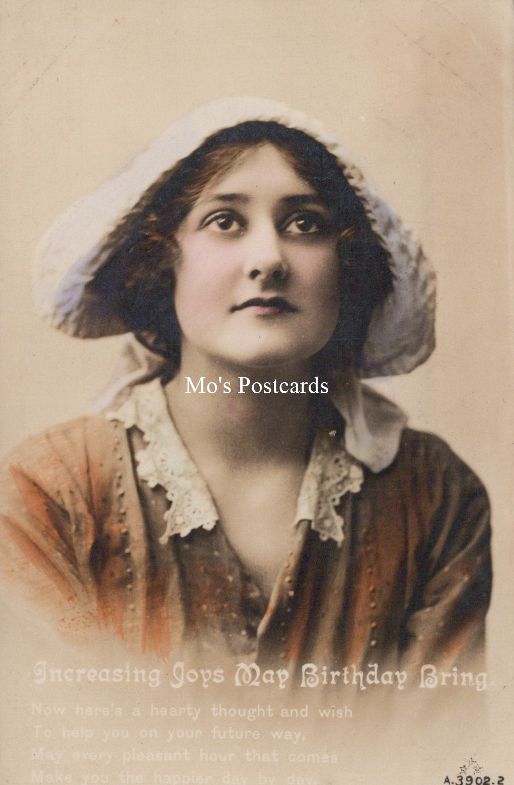 Vintage-style postcard with a woman wearing a white bonnet and brown dress, featuring 'Mo's Postcards' branding.