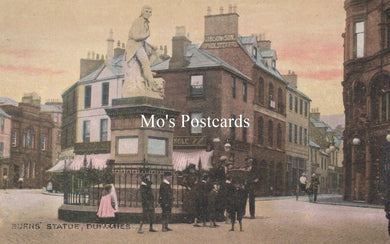 Vintage postcard of a statue in a town square with 'Mo's Postcards' branding.