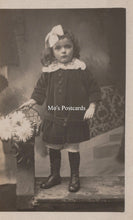 Load image into Gallery viewer, Vintage photograph of a young girl in formal attire with a decorative bow, labeled &#39;Mo&#39;s Postcards&#39;.
