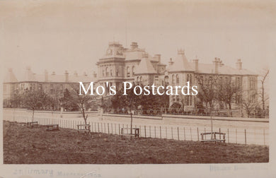 Vintage-style image of a large building with 'Mo's Postcards' text overlay