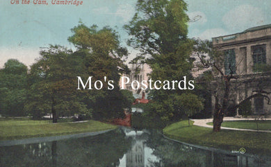 Vintage-style postcard with a scenic view of a building and trees 