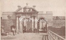 Load image into Gallery viewer, Vintage black and white photo of a stone building with people gathered outside 
