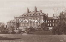 Load image into Gallery viewer, Vintage black and white photograph of a large building 
