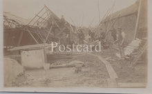 Load image into Gallery viewer, Vintage black and white photograph of a shipwreck with people around it, labeled &#39;Postcard&#39;.
