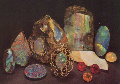 Collection of opal stones and crystals on a dark background