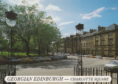 Georgian Edinburgh with Charlotte Square, cars parked on the street, and trees lining the area.