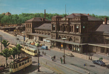 Load image into Gallery viewer, Vintage-style painting of a city street with tram tracks, buildings, and people.

