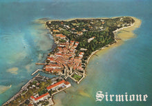 Load image into Gallery viewer, Aerial view of Sirmione on an island with clear blue water.
