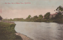 Load image into Gallery viewer, Vintage postcard of a river scene with trees and buildings in the background.
