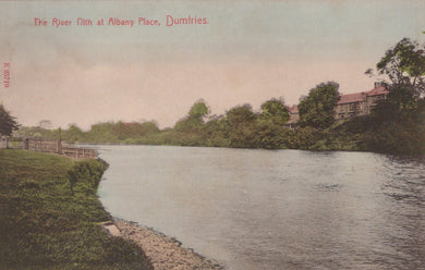 Vintage postcard of a river scene with trees and buildings in the background.