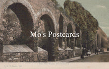 Load image into Gallery viewer, Vintage-style image of stone arches  
