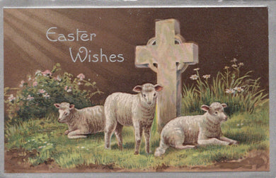 Vintage Easter card with sheep and a cross, featuring 'Easter Wishes' text.