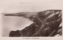 Load image into Gallery viewer, Vintage black and white photograph of a coastal landscape with a road and cliffs.
