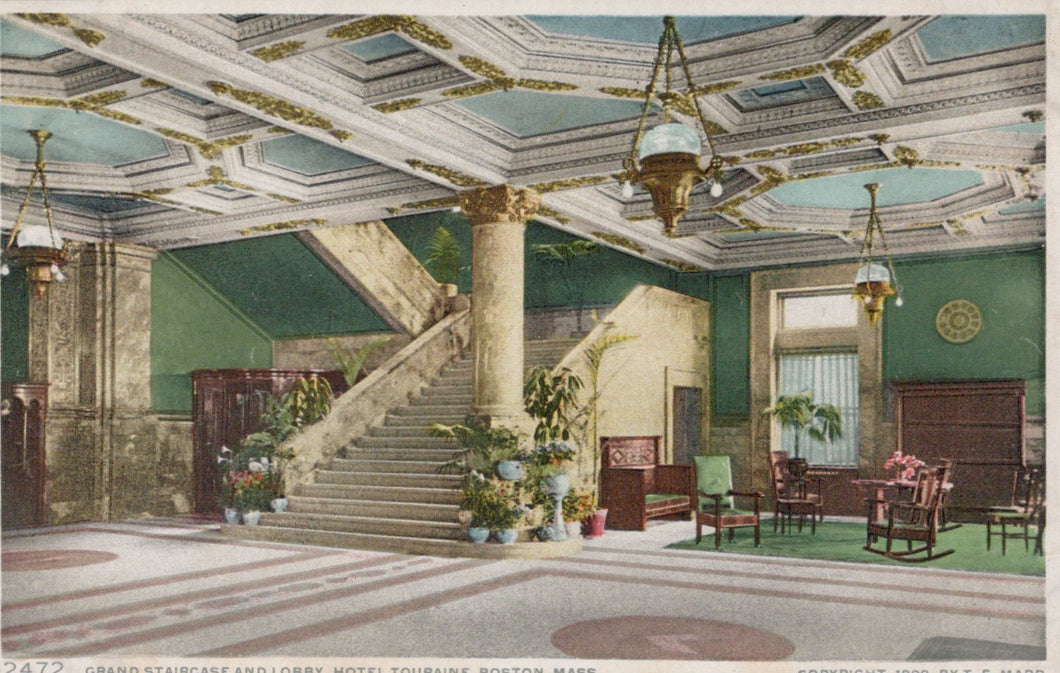 Decorative interior of a hotel lobby with staircase and elegant decor