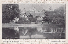 Load image into Gallery viewer, Vintage black and white photograph of a house with a pond and trees
