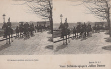 Load image into Gallery viewer, Stereoscopic image of a military procession with horses and soldiers on a street.

