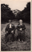 Load image into Gallery viewer, Ancestors Postcard - Elderly Couple Sat in a Field  SW16963
