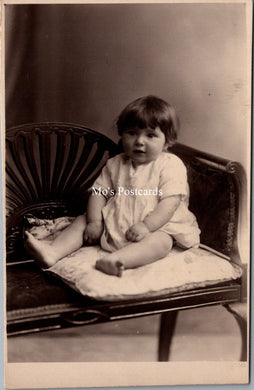 Ancestors Postcard - Young Child Sat on a Couch  SW16844