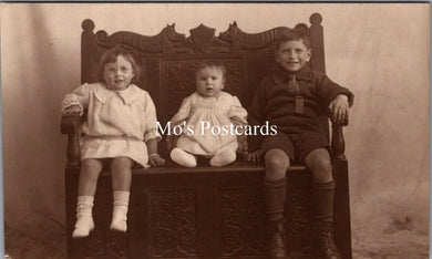 Ancestors Postcard - Three Children Sat on an Ornate Wooden Bench  SW16845