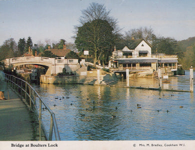 Bridge at Boulter's Lock with ducks in the water and buildings in the background.