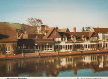 Load image into Gallery viewer, Victorian-style buildings along a waterfront with a clear sky.
