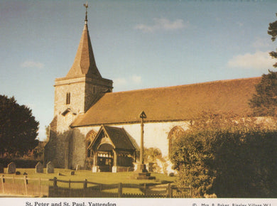 Church of St. Peter and St. Paul in Yattendon with a thatched roof and steeple.