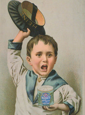 Vintage advertisement featuring a boy holding a Heinz product