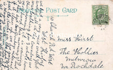 Load image into Gallery viewer, Vintage postcard with text and a stamp on a light brown background
