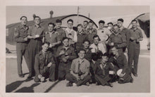 Load image into Gallery viewer, Group of men in military uniforms posing in front of an airplane
