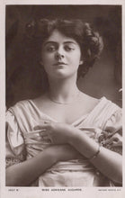 Load image into Gallery viewer, Vintage black and white portrait of a woman with a decorative headpiece
