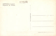 Load image into Gallery viewer, Back of a postcard with text and a grid for writing, on a beige background.
