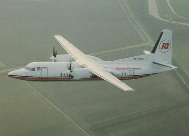 White airplane with 'Kerry Airways' branding flying over a landscape.
