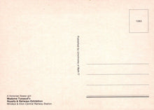 Load image into Gallery viewer, Back of a postcard with text and a small square with number 1283 on a beige background

