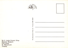 Load image into Gallery viewer, Back of a postcard with text and a logo, featuring a white background.
