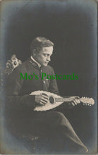 Load image into Gallery viewer, Musical Postcard - Man in a Uniform Playing a Musical Instrument  RS28745
